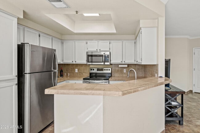 Building Photo - 9450 E Becker Ln