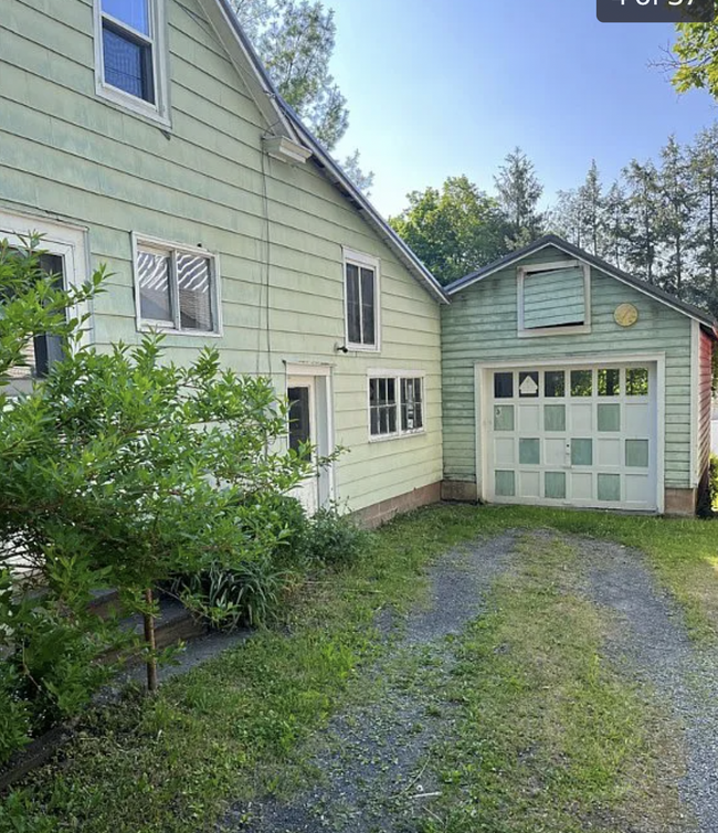 1 parking spot in garage, one parking spot in driveway. - 7 Woolerton St