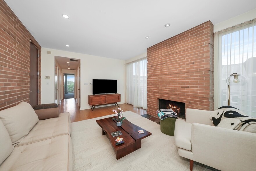 Living room with fireplace - 1700 W Ohio St