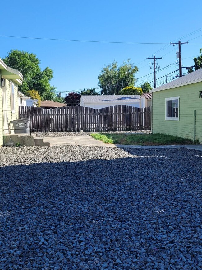 Building Photo - Free May rent with 1 Year Lease - Fully Remodeled with Garage & Yard Care Included