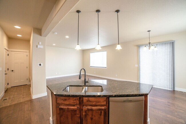 Building Photo - Bright & Spacious 3 Bed + Loft | 3-Car Garage in North Fort Collins