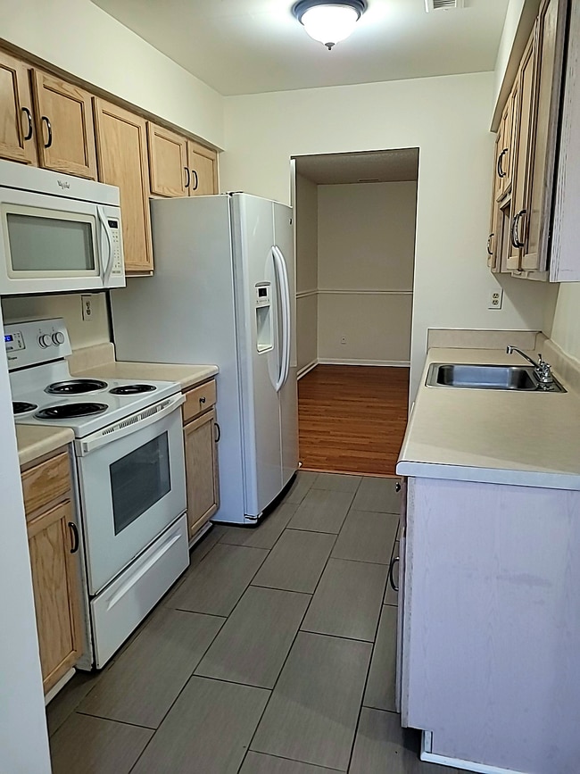 Building Photo - Spacious 3BR Townhome • $2,150 • Fenced Yard + Bonus Room • Prime Location