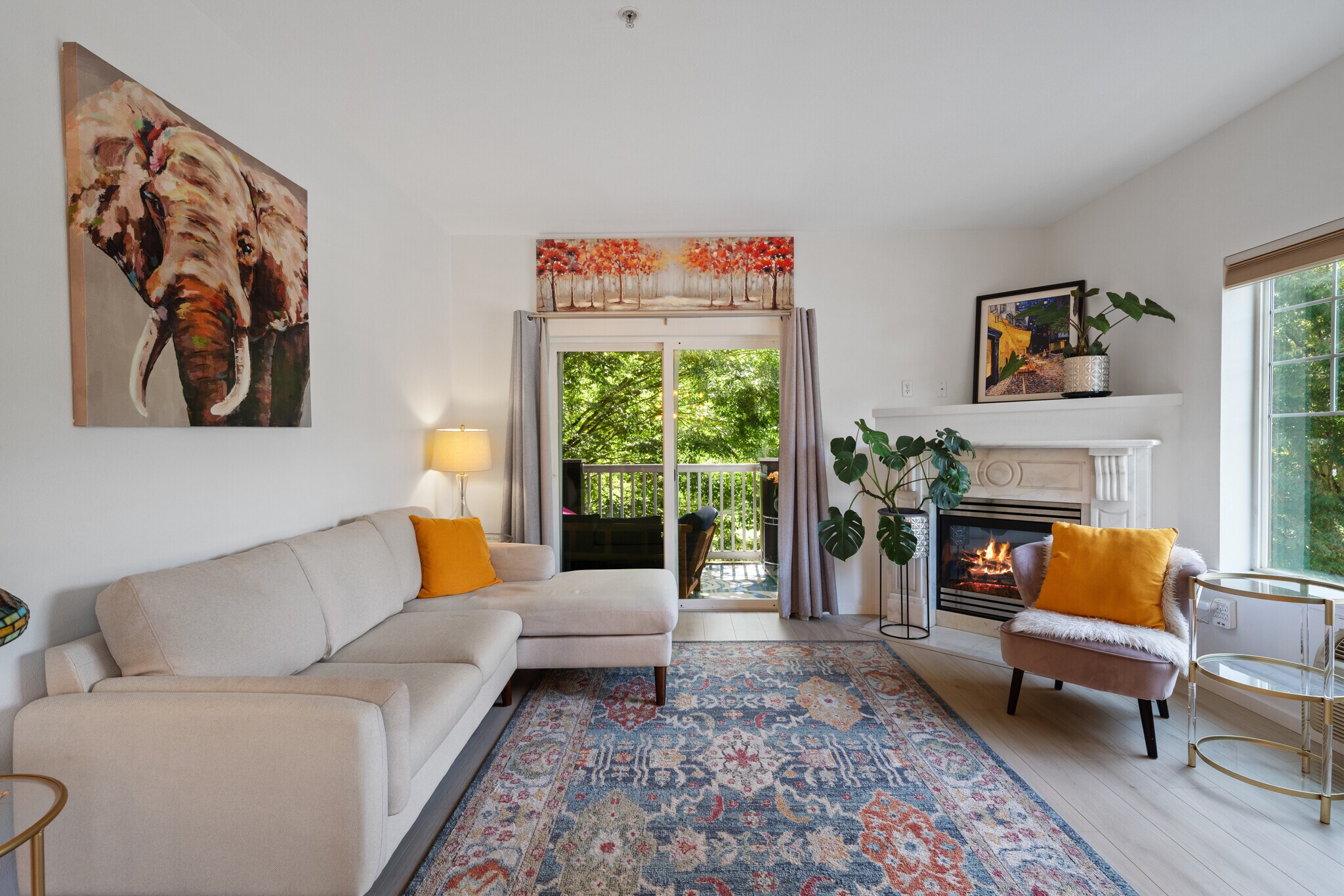 Living Room and Marble Gas Fireplace - 10800 SE 17th Cir