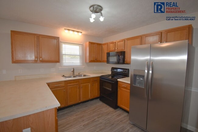 Building Photo - Adorable 3BR/2BA, attached 2 car garage in N. Murfreesboro on a corner lot!