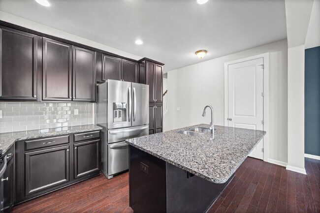 Building Photo - Move-In Ready Fort Mill Townhome with Garage, Hardwood Floors & Fresh Updates!