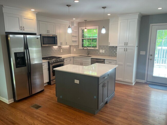 Building Photo - Coming Soon! 4 BR/2BA | Newly Renovated Single Family Home | 2-Car Garage Parking | Lots of storage!