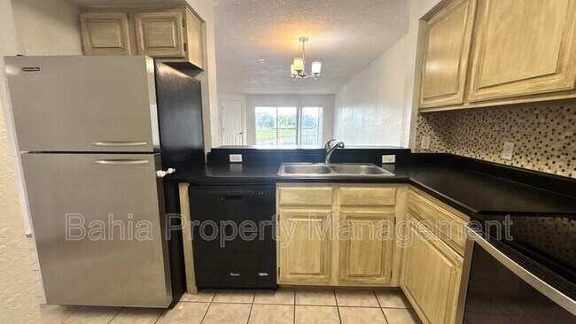 Building Photo - 13803 Fairway Island Dr