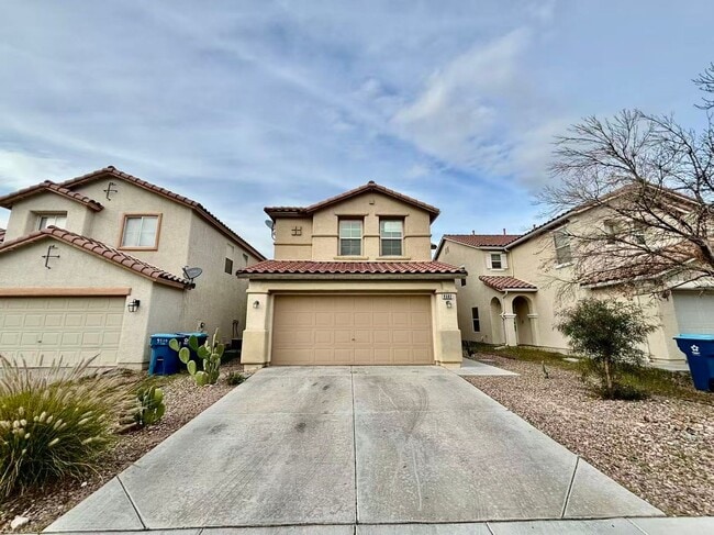 Building Photo - Welcome to this charming 4 bedroom, 2.5 bathroom home.