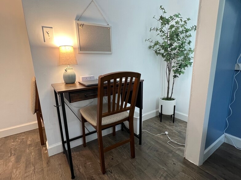 A desk makes a dedicated workspace or a place to browse the internet. Alarm clock and noise machine. - 908 Lake Rd