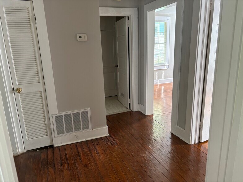 Hallway looking towards Living Room and Bathroom - 417 S Woodrow St
