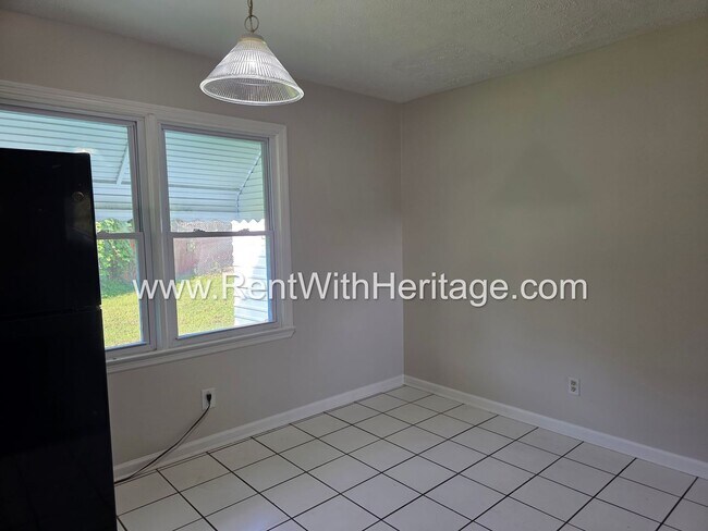 Building Photo - 5990 Peco Ln