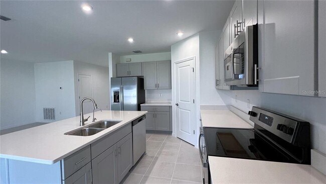 Building Photo - 5557 Tranquila Ln