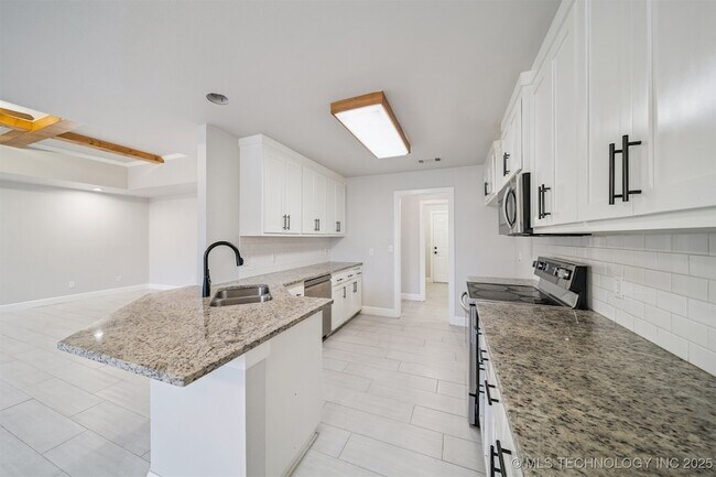 Building Photo - 7922 N 125th E Ave