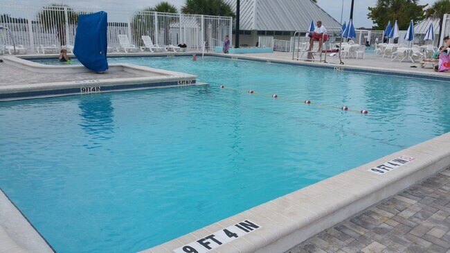 Building Photo - "Elegant 3-Bed Waterfront pool Home"