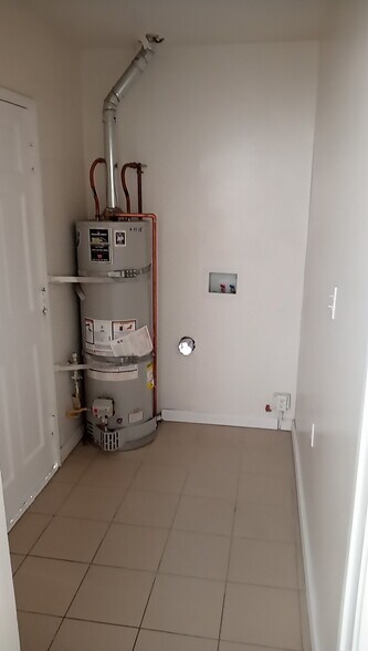 Laundry room - 10636 Louise Ave