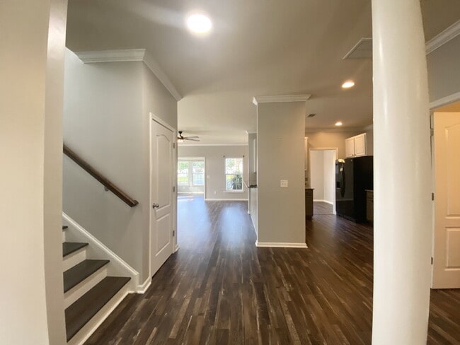 Building Photo - Three Bedroom Home with fenced-in Backyard oasis!