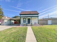 Building Photo - Los Alamitos 4 Bed 2 Bath House - 2 Car Gar - Wood Flooring - Huge Yard - Cute!!!
