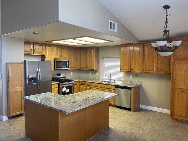 Building Photo - 1 story home, 4brs, 2bath, 2cg