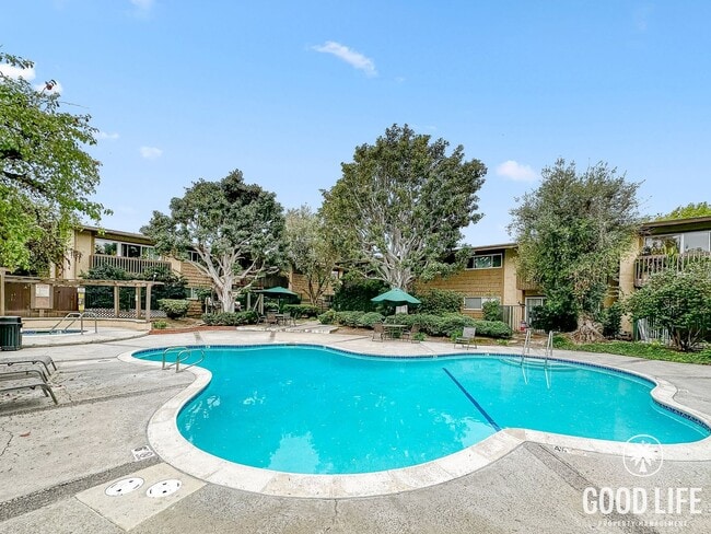 Building Photo - PRICE REDUCTION! 2BR in Gated Community | Pool, Jacuzzi & Balcony