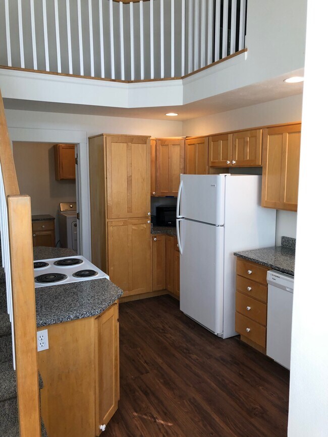 Kitchen with new granite countertops, flooring and appliances - 1147 E Garfield Ave