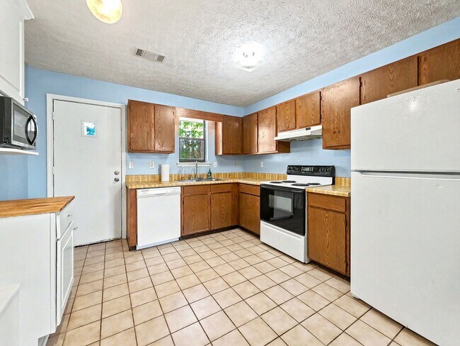 Building Photo - Tibbitts Drive Duplex