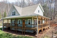 Building Photo - East AVL - Contemporary Farmhouse on Large Wooded Lot