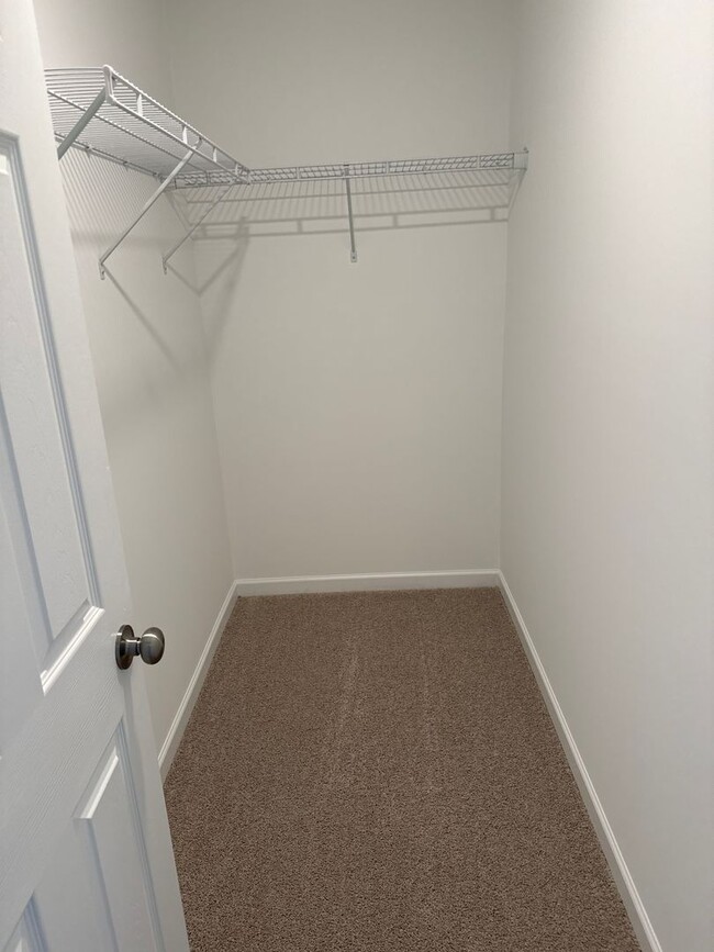 Building Photo - *Preleasing Now* -Three Bedroom | Two and a Half Bath Townhome in Driftwood | Lincoln Schools!