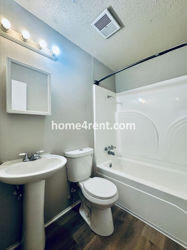 Building Photo - Newer LVP Flooring, Paint and SS Appliance...