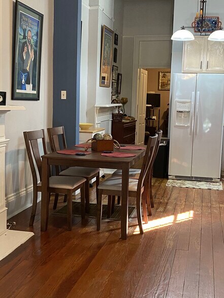 New dining table in kitchen area. - 4634 Orleans Ave