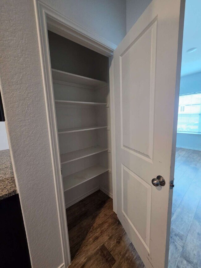 Building Photo - Ready Now – Freshly Painted & Move-In Ready!