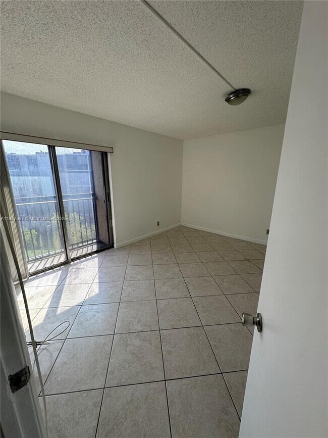 Building Photo - 8740 N Sherman Cir