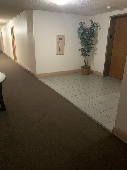 Across rear elevator - 9310 Fontainebleau Blvd