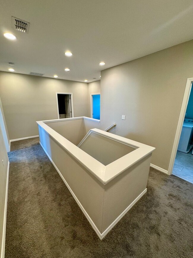 Building Photo - Move in ready 3/2 New Construction Townhou...