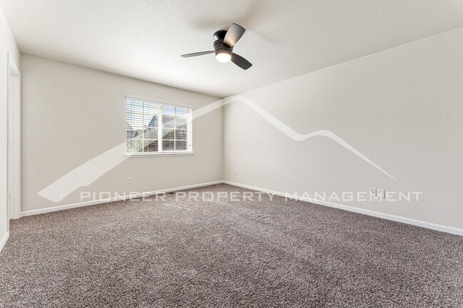Building Photo - Spacious Home with Fenced Yard and Central AC