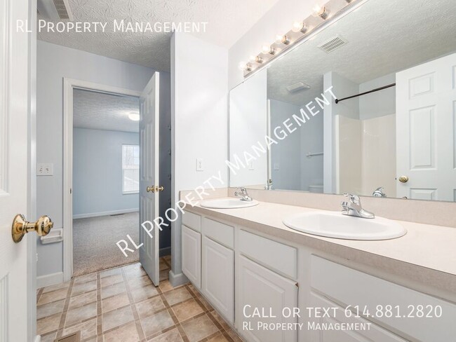 Building Photo - Nice 2 Bedroom/1.5 Bathroom Condo