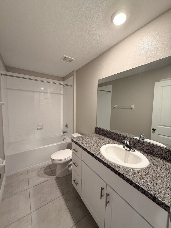 Building Photo - LIKE NEW 4-Bedroom, 2 Bath home in Triple ...