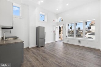 Building Photo - 6940 Woodland Ave