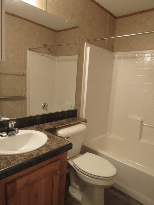 Building Photo - 3 Bed 2 bath Mills Mobile Home on Beautiful Treed Lot