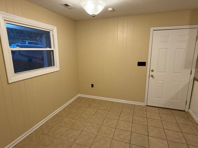 Building Photo - Updated 4BR Home with Finished Basement & Level Yard