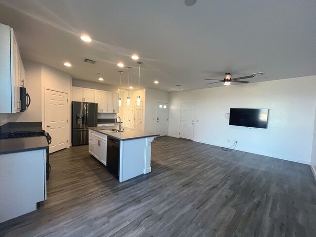 Building Photo - Single-story 1326 sq ft, townhome built in 2019 w/3 bed, 2 bath & spacious attached 2-car garage ...