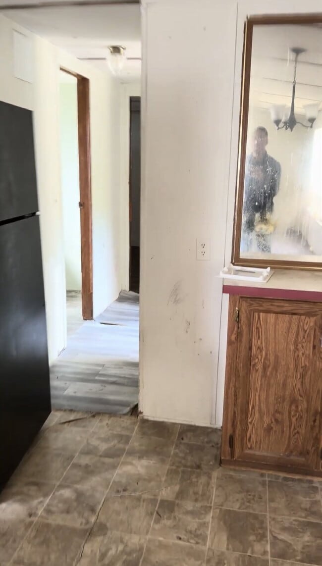 Building Photo - Handyman Special – Land + Home (Rent-to-Own)