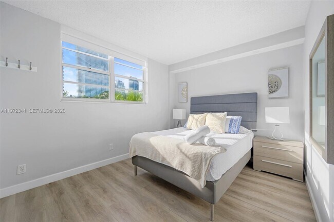 Building Photo - 19370 Collins Ave