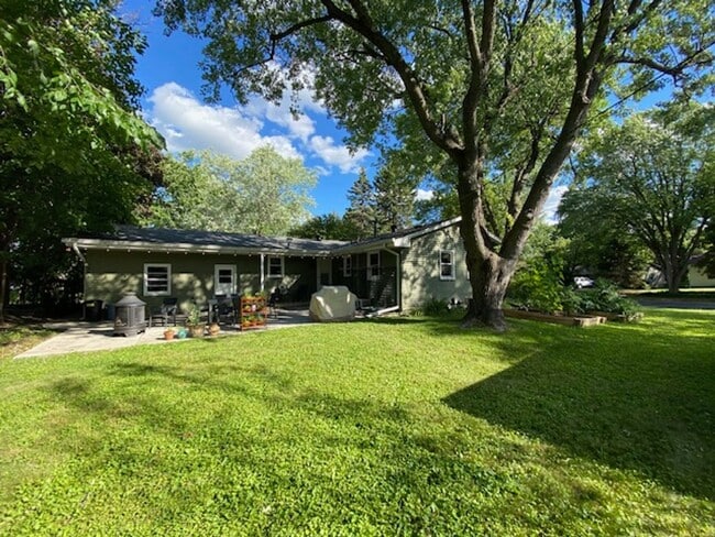 Building Photo - Spacious 4-Bedroom Home with Pond Views & EV-Ready Garage – Bloomington!!