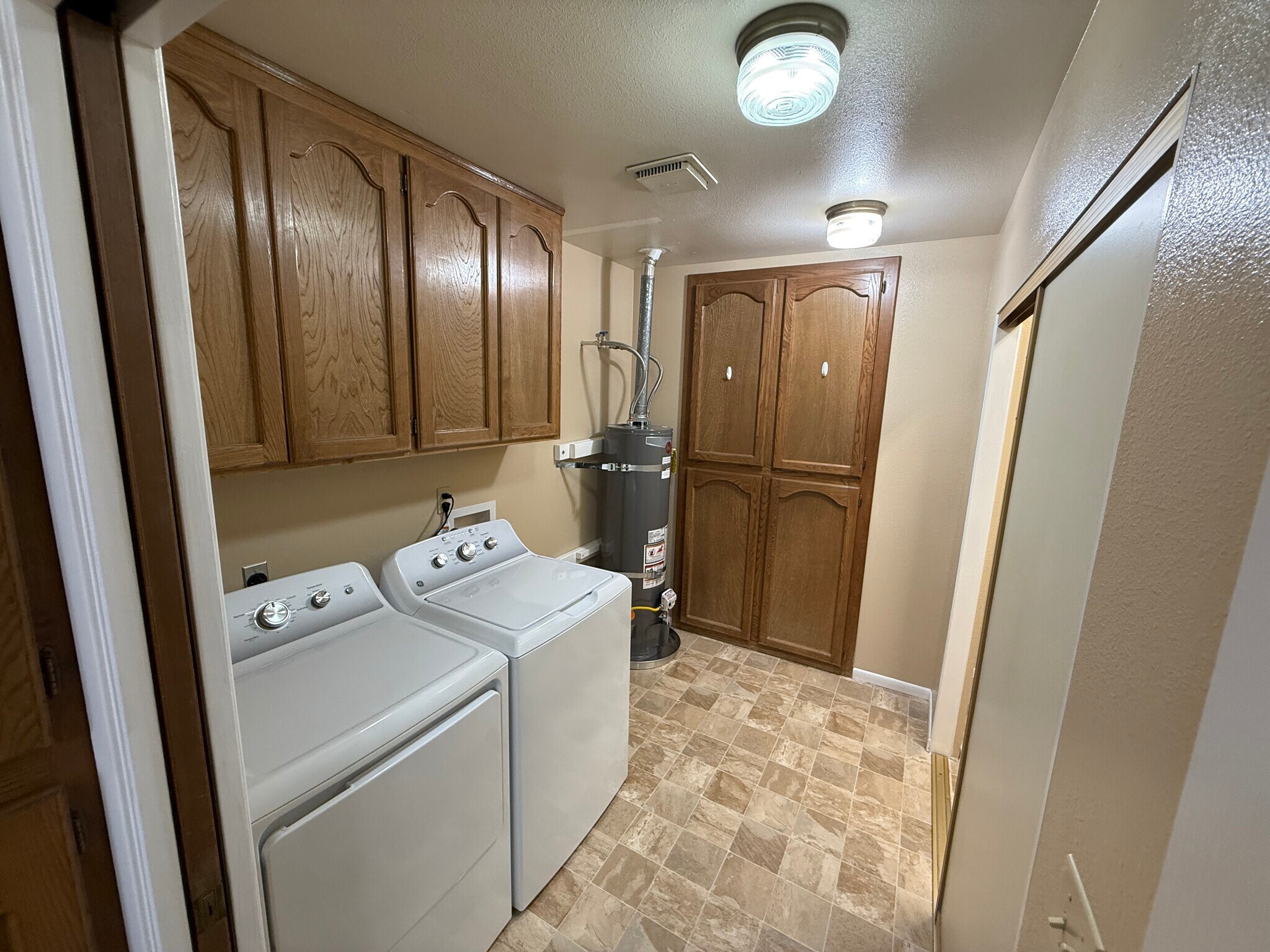 Laundry and storage, brand new appliances throughout - 15936 Lime St