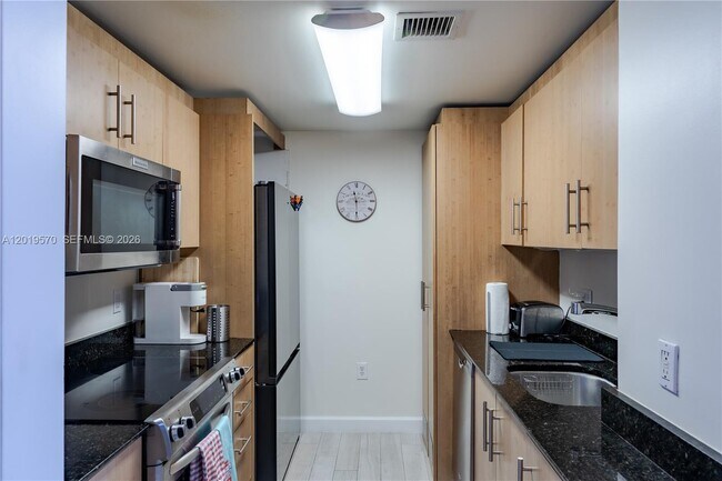 Building Photo - 10275 Collins Ave