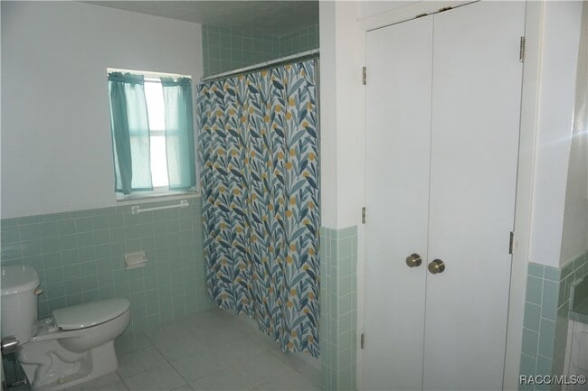 Building Photo - 9306 N Santos Dr