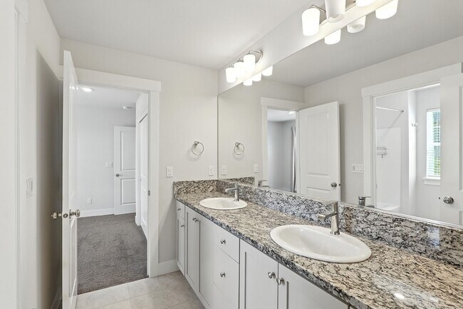 Building Photo - Spacious 4-Bedroom Home, Plus Den/Office with Modern Upgrades and Great Amenities