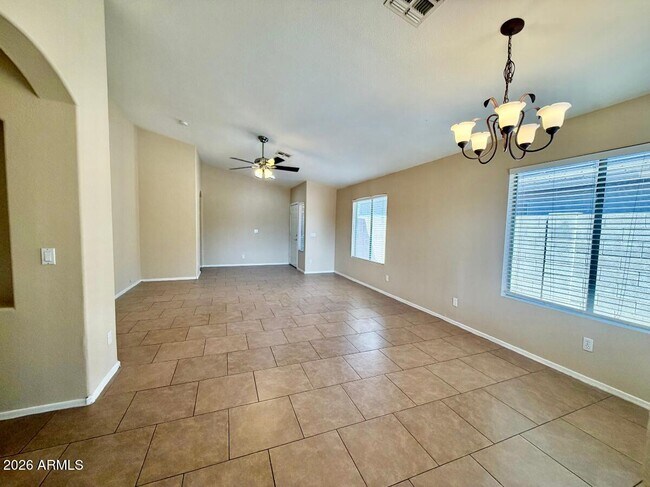 Building Photo - 9323 W Harmony Ln