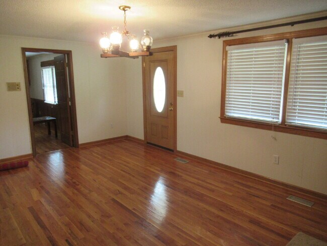 Building Photo - Charming All-Brick Ranch with Finished Bas...