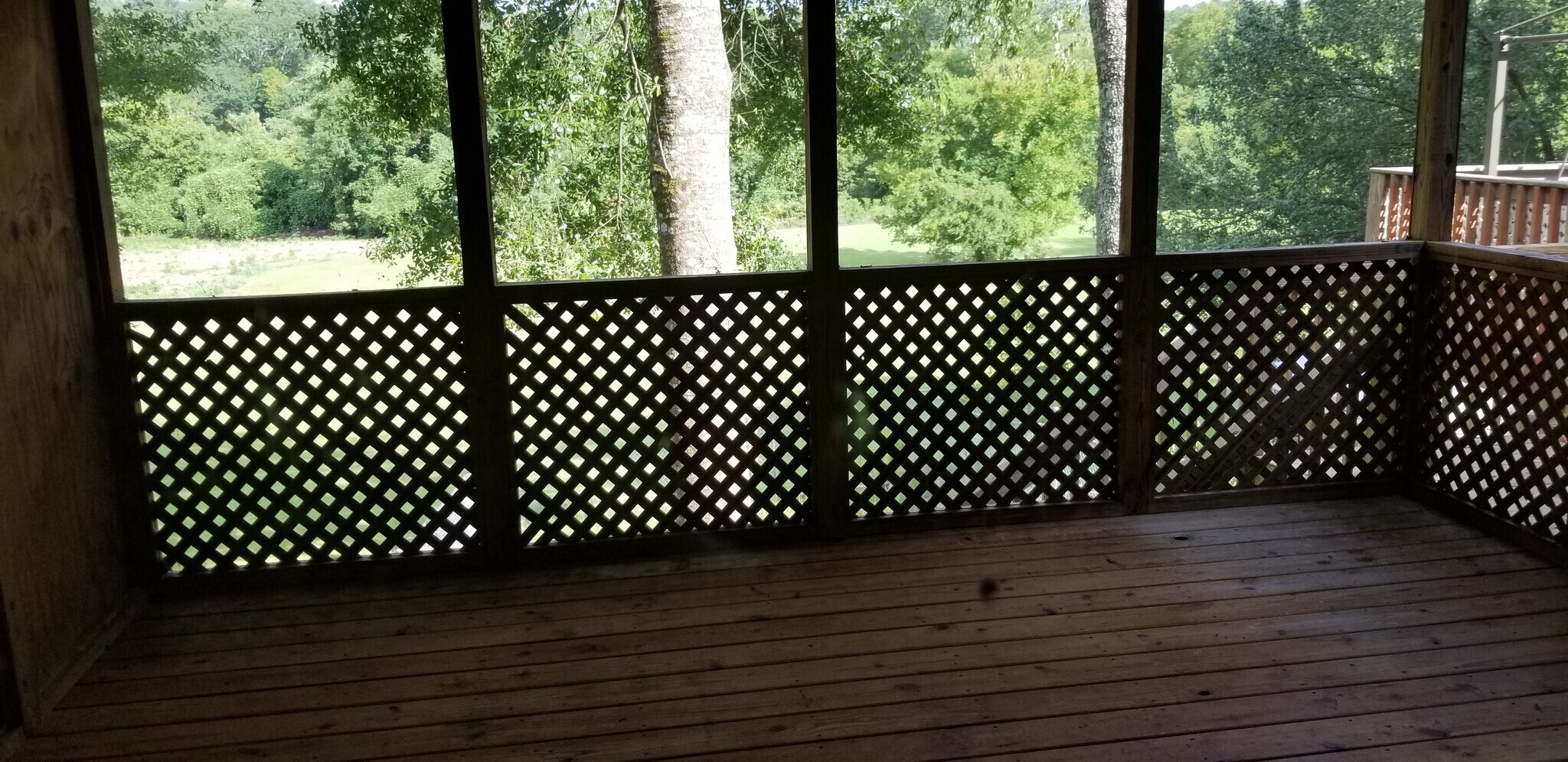 screened deck overlooks fen yd - 804 Old Rocky Ridge Ln